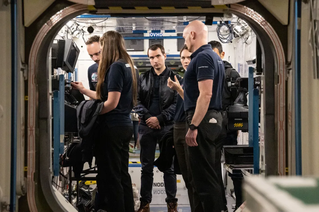 The Astronauts familiarize themselves with the model of the ISS in Houston.