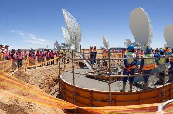 research infrastructures- SKAO Construction site in the desert with telescopic antennas in the background.