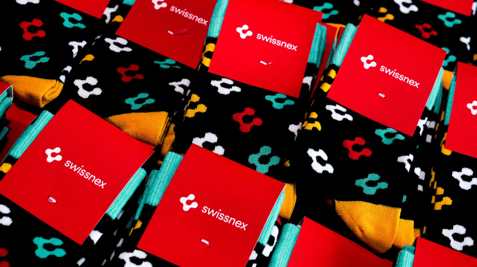 1 Coloured socks with the Swissnex logo.