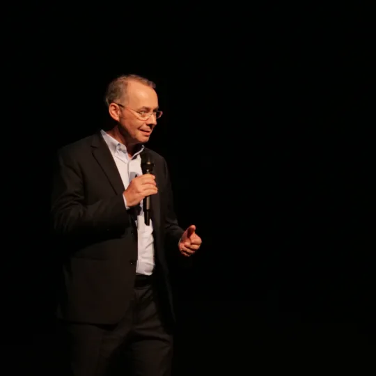 Felix Moesner, CEO of Japan, is standing on stage and speaking into the microphone.