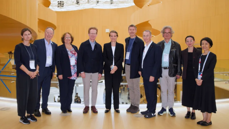 A group of people looking at the camera for a photograph.